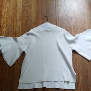 Anthropologie ivory bell-sleeve sweater